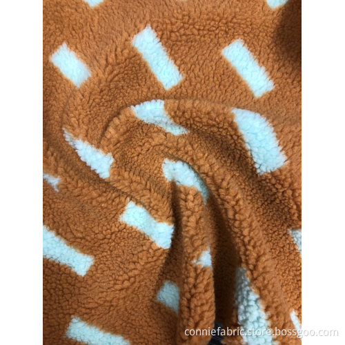 100% polyester sherpa jacquard med mönster